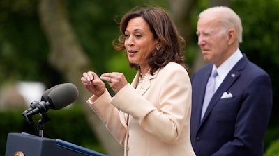 President Joe Biden listens as Vice President Kamala Harris speaks in the Rose Garden of the White House in Washington, Monday, May 1, 2023, about National Small Business Week.