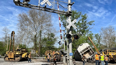 Recovery work at the scene of a train derailment outside New Castle, Pa., May 11, 2023.