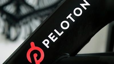 A Peloton logo is seen on the company's stationary bicycle on Nov. 19, 2019, in San Francisco, Calif.