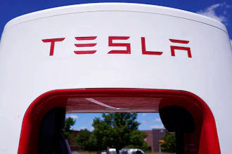 A Tesla Supercharger is seen at Willow Festival shopping plaza parking lot, Aug. 10, 2022, in Northbrook, Ill.