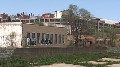 An old factory building in Highland Park, Mich., a small Detroit enclave is seen on May 9, 2023.