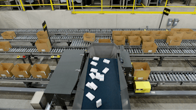 Pharmaceutical orders fall into boxes as workers make sure the orders are complete at Morris and Dickson Co., in Shreveport, Wednesday, July 13, 2016.