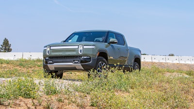 This photo provided by Rivian shows the R1T, one of the first electric pickup trucks to hit the U.S. market.