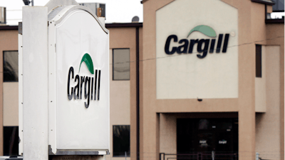 Cars sit parked at a Cargill Inc., turkey processing plant on Aug. 4, 2011, in Springdale, Ark.