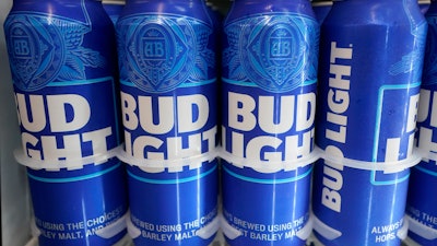 Cans of Bud Light chill in a refrigerator in Oakland, Calif., Friday, April 28, 2023.