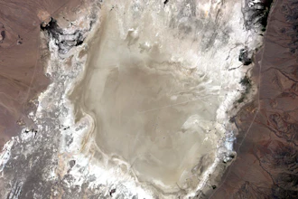 In this undated photo provided by NASA, a satellite captures the Railroad Valley (RRV), a dry lakebed in Nevada, for conducting ground-based calibration of Earth-observing satellite instruments.