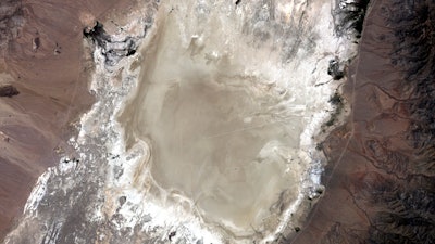 In this undated photo provided by NASA, a satellite captures the Railroad Valley (RRV), a dry lakebed in Nevada, for conducting ground-based calibration of Earth-observing satellite instruments.