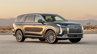 This photo provided by Hyundai shows the 2023 Hyundai Palisade a midsize three-row SUV. Both the Palisade and its corporate cousin, the Kia Telluride, are top picks in this class.