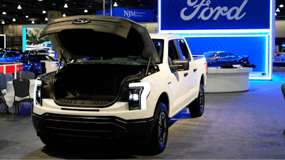 The Ford F-150 Lightning sits on display at the Philadelphia Auto Show, Jan. 27, 2023, in Philadelphia.