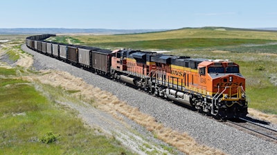 A BNSF railroad train hauling carloads of coal from the Powder River Basin of Montana and Wyoming is seen east of Hardin, Mont., July 15, 2020.