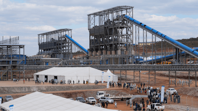 People are seen on the grounds of Prospect Lithium Zimbabwe's processing plant in Goromonzi about 80 kilometers southeast of the capital Harare, Wednesday, July 5 2023.