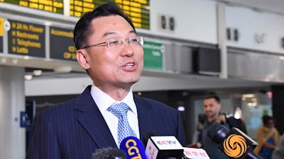 In this photo released by Xinhua News Agency, Xie Feng, China's new ambassador to the United States, speaks to the media upon his arrival at the John F. Kennedy International Airport in New York on May 23, 2023.