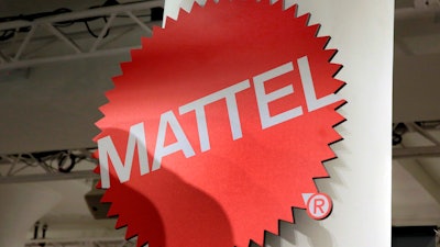 The Mattel logo is seen, April 26, 2018, at the TTPM 2018 Spring Showcase in New York. Toy maker Mattel is renewing its licensing deal with Warner Bros. Discovery Global Consumer Products.