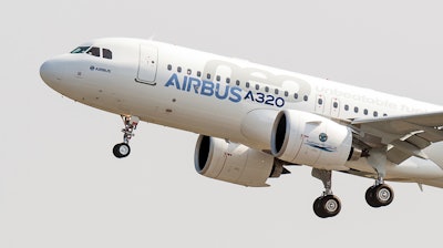 The new Airbus A320neo takes off for its first test flight at Toulouse-Blagnac airport, southwestern France, Sept. 25, 2014.