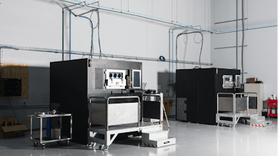 Two Velo3D Sapphire additive manufacturing (AM) systems installed at an ADDMAN facility.