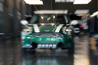 An unsold 2024 Cooper S hardtop sits in a Mini dealership Friday, July 21, 2023, in Highlands Ranch, Colo.