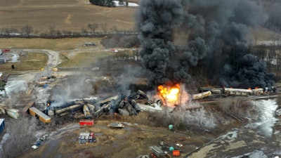 This photo taken with a drone shows portions of a Norfolk and Southern freight train that derailed Friday night in East Palestine, Ohio are still on fire at mid-day Saturday, Feb. 4, 2023.