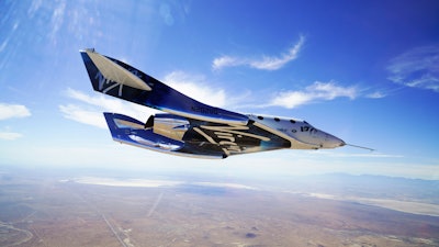 In this May 29, 2018 photo provided by Virgin Galactic, the VSS Unity craft flies during a supersonic flight test.