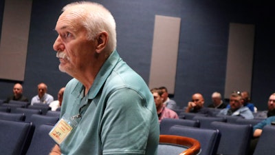 Retired West Virginia coal miner Terry Lilly, who has black lung, speaks during a public hearing hosted by the federal Mine Safety and Health Administration about its draft rule to limit worker exposure to silica dust at the agency's office in Beaver, W.Va. on Thursday, Aug. 10, 2023.