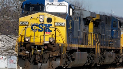 A CSX freight train passes through Homestead, Pa., Feb. 12, 2018.