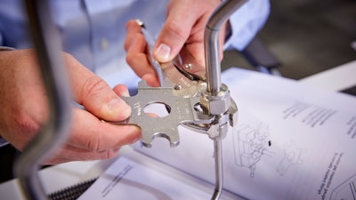 Figure 1. Gap inspection tools should be employed to make sure fittings are tightened properly to prevent leaks.