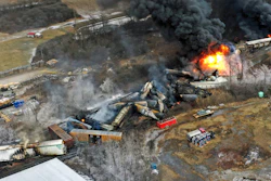 In this photo taken with a drone, portions of a Norfolk Southern freight train that derailed the previous night in East Palestine, Ohio, remain on fire at mid-day, Feb. 4, 2023.