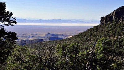This undated image provided by the Southern Utah Wilderness Alliance, pinyon pine and juniper trees grow on a mountain range north of Sevier Lake in Millard County, Utah. Environmentalists filed a lawsuit on Monday, July 31, 2023, to prevent the construction of a new potash mine that they say would devastate a lake ecosystem in the drought-stricken western Utah desert.