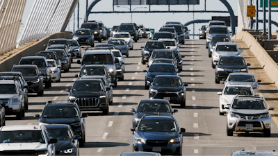 Heavy traffic heads south on Interstate 93 over the Zakim Bridge, Friday, Sep. 1, 2023, in Boston. Cars are getting an “F” in data privacy.