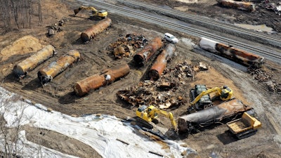 Cleanup continues, Feb. 24, 2023, at the site of a Norfolk Southern freight train derailment that happened on Feb. 3 in East Palestine, Ohio.