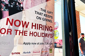 A hiring sign is displayed at a retail store in Vernon Hills, Ill., Thursday, Aug. 31, 2023.