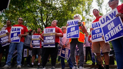 United Auto Workers members and supporters picket outside a General Motors facility in Langhorne, Pa., Friday, Sept. 22, 2023.