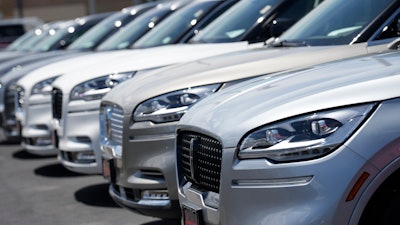 Unsold 2023 Aviator sports-utility vehicles sit in a long row at a Lincoln dealership on June 18, 2023, in Englewood, Colo.