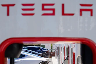 Tesla vehicles charge at a station in Emeryville, Calif., Wednesday, Aug. 10, 2022.