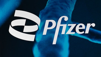 The Pfizer logo is displayed at the company's headquarters, Friday, Feb. 5, 2021, in New York.