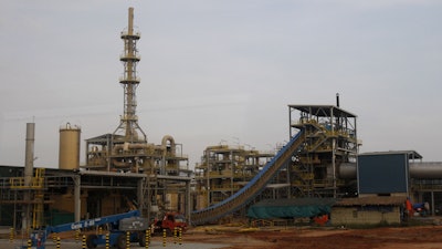 Construction vehicles are parked at the site of Lynas' rare earths plant in Gebeng, eastern Malaysia, Thursday, April 19, 2012.