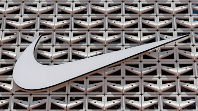 The Nike logo is shown on a store in Miami Beach, Fla. on Aug. 8, 2017.
