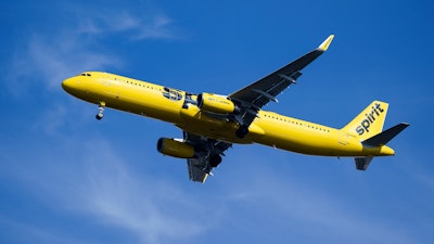 A Spirit Airlines jet approaches Philadelphia International Airport in Philadelphia, Feb. 24, 2021.