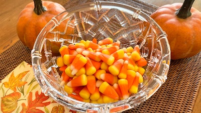 This image shows a bowl of candy corn in Westchester County, N.Y. on Oct. 23, 2023.