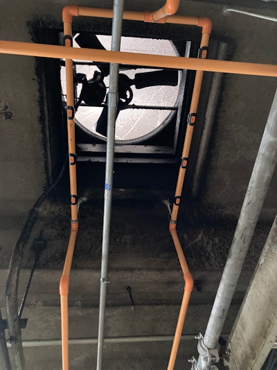 The meat processing plant chose a piping network that draws in air from the protected area to a central location.