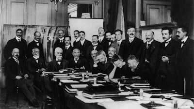 Photograph of the first Solvay Conference in 1911 at the Hotel Metropole. Heike Kamerlingh Onnes is standing third from the right.