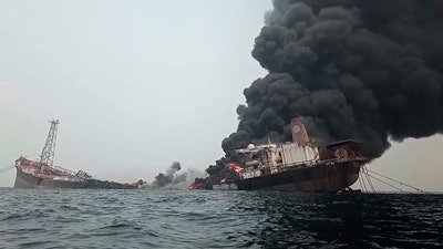 This image from video provided by Bolaji John shows the burning Trinity Spirit anchored 15 miles off the coast of Nigeria, which caught fire on Feb. 2, 2022.