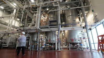 Fermentation tanks containing mushroom roots stand in the production facility of Meati Wednesday, July 26, 2023, in Thornton, Colo. In four days, a single microscopic spore can produce the equivalent of a whole cow’s worth of meat. ()