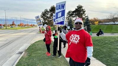 Anthony Collier, 54, and other striking United Auto Workers members picket Saturday, Oct. 28, 2023, outside of a Stellantis plant.