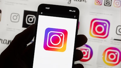 The Instagram logo is seen on a cell phone in Boston, Oct. 14, 2022.
