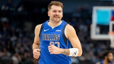 Dallas Mavericks guard Luka Doncic runs down the court during the first half of an NBA basketball game against the Toronto Raptors, Wednesday, Nov. 8, 2023, in Dallas.