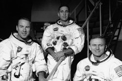 Apollo 8 astronauts, from left, James Lovell, command module pilot; William Anders, lunar module pilot; and Frank Borman, commander; stand in front of mission simulator prior to training in exercise for their scheduled six-day lunar orbital mission at the Kennedy Space Center in Florida, Dec. 18, 1968.