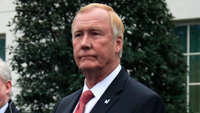 NuScale Power chairman and CEO John L. Hopkins, listen outside the West Wing of the White House in Washington, following the energy executives' meeting with President Donald Trump on Feb. 12, 2019.