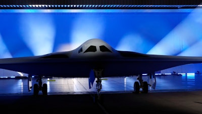 The B-21 Raider stealth bomber is unveiled at Northrop Grumman, Dec. 2, 2022, in Palmdale, Calif.