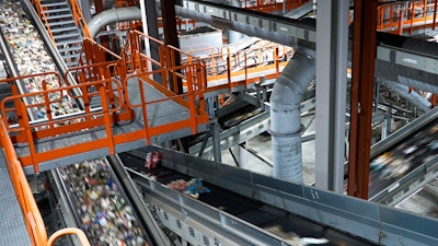 Plastic waste runs on conveyor belts at a new plastic waste sorting facility, Motala, Sweden, Nov. 9, 2023.