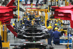 Workers assemble mini excavators in a factory of heavy machinery in Suzhou in eastern China's Jiangsu province on Oct. 23, 2023. An official survey of Chinese manufacturers showed that factory activity contracted for a second straight month in November, an indicator of weak demand even as policymakers have introduced stimulus measures to jumpstart the economy.